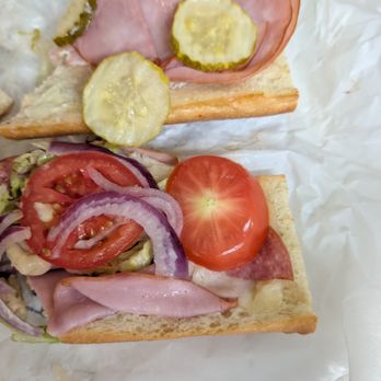 Tubs Gourmet Subs - Notice gross tomato slice - Sandwiches Near Me - Lynnwood, Washington Tubs Gourmet Subs - Notice gross tomato slice - Sandwiches Near Me - Lynnwood, Washington
