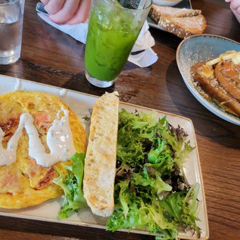First Watch - Salmon Frittata with chive drizzle, Kale Tonic, and Banana Foster French Toast - Breakfast & Brunch Near Me - Cary, North Carolina First Watch - Salmon Frittata with chive drizzle, Kale Tonic, and Banana Foster French Toast - Breakfast & Brunch Near Me - Cary, North Carolina