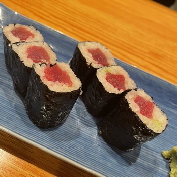 Kurumazushi - two pieces of sushi on a blue plate - Sushi Bars Near Me - New York, New York Kurumazushi - two pieces of sushi on a blue plate - Sushi Bars Near Me - New York, New York