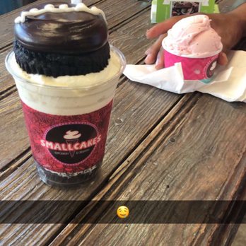 Smallcakes Longview - a cup of ice cream with a chocolate frosting on top - Cupcakes Near Me - Longview, Texas Smallcakes Longview - a cup of ice cream with a chocolate frosting on top - Cupcakes Near Me - Longview, Texas