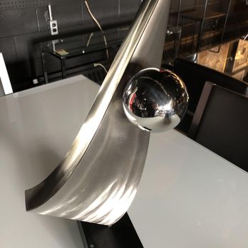 Living Modes - Brushed steel and chrome accessory piece with a solid black metal base. Works as a centerpiece as well, adding depth and space to the room. - Furniture Stores Near Me - Ferndale, Michigan