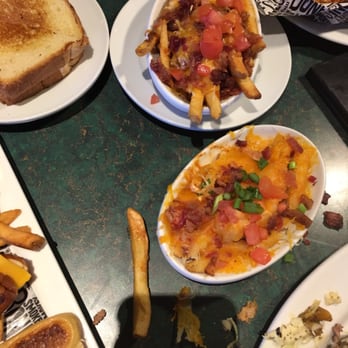 Smokey Bones - Fries closer to camera are the first order other fries are after they fixed them clearly a big difference in quality - Barbeque Near Me - cheektowaga, New York Smokey Bones - Fries closer to camera are the first order other fries are after they fixed them clearly a big difference in quality - Barbeque Near Me - cheektowaga, New York