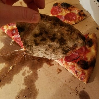 Duman Artisan Kitchen - Bottom of pizza burnt as well as crust. - Pizza Near Me - Mandeville, Louisiana