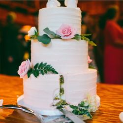Crumb Cakery - Pistachio raspberry wedding cake with ombré blush textured buttercream and fresh flowers and geeenery
