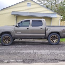 HD Truck Center - My Tacoma with his new shoes and leveled out!  Thanks HD and Mr. Remington!!