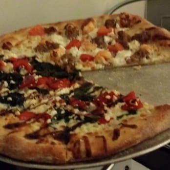 Lola's - 1/2 Spinach & Feta, 1/2 Spicy Shrimp & Sausage - Pizza Near Me - Charleston, West Virginia Lola's - 1/2 Spinach & Feta, 1/2 Spicy Shrimp & Sausage - Pizza Near Me - Charleston, West Virginia