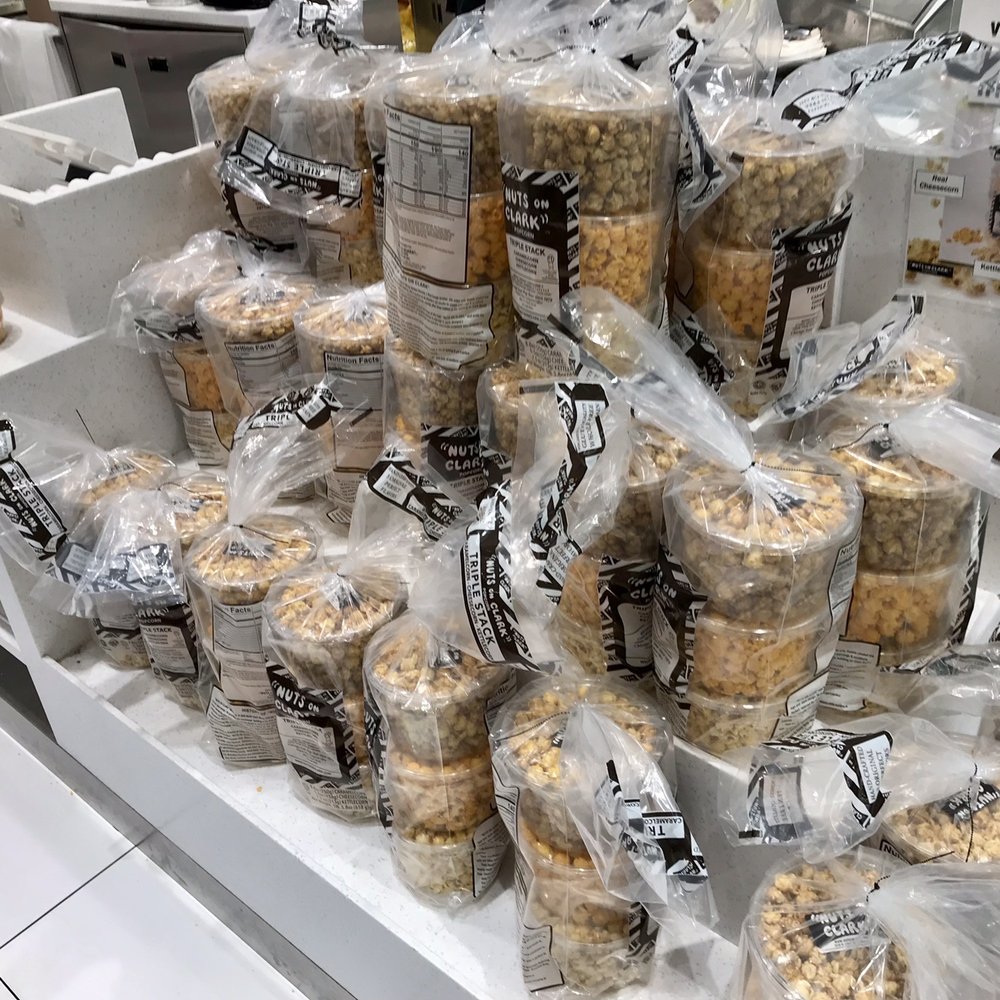 Nuts On Clark - a display in a grocery store - Popcorn Shops Near Me - Chicago, Illinois Nuts On Clark - a display in a grocery store - Popcorn Shops Near Me - Chicago, Illinois