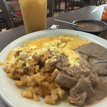 Juan In A Million - Con queso breakfast - Mexican Near Me - Austin, Texas