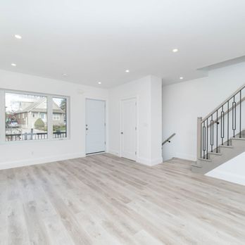 OPC Group - empty living room - General Contractors Near Me OPC Group - empty living room - General Contractors Near Me