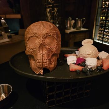 CHICA - Flaming Skull dessert ($38): warm lava cake, horchata ice cream, corn marshmallows - Latin American Near Me - Las Vegas, Nevada CHICA - Flaming Skull dessert ($38): warm lava cake, horchata ice cream, corn marshmallows - Latin American Near Me - Las Vegas, Nevada