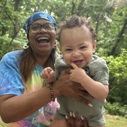 Dove With Love - One of our caregivers with her grandchild