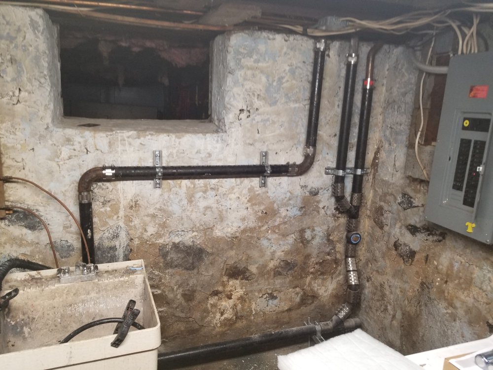Slide of Cross Joint Plumbing and Heating