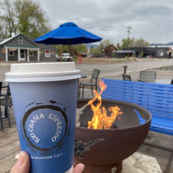 Rio Chama Espresso Kitchen & Wine Bar - a cup of coffee in front of a fire pit - Coffee & Tea Near Me - Chama, New Mexico Rio Chama Espresso Kitchen & Wine Bar - a cup of coffee in front of a fire pit - Coffee & Tea Near Me - Chama, New Mexico
