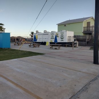 Arney’s Bayside Grill - The food truck and area . Also restrooms building behind it - Burgers Near Me - Galveston, Texas