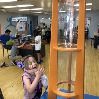 TinkerSpace - Kids in the background are building legos and doing a make-your-own robot workshop (note: some workshops are extra). - Makerspaces Near Me