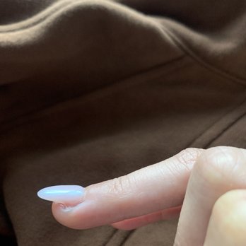 Relax Nails & Spa - ring finger is glued a bit upward and crooked - Nail Salons Near Me - Austin, Texas