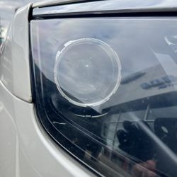 Quirk Ford - 2 Ford Fusion Low beam Headlamp bulbs installed, "$175."