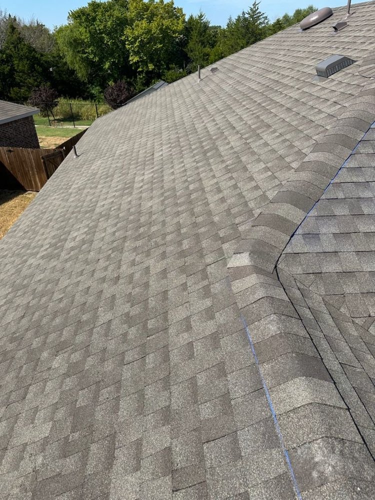 Slide of All American Contractors