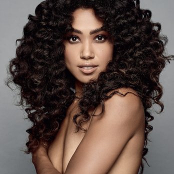 Salon 718 - Myrtle Ave - [Chelsea] Embrace your voluminous curls and natural hair with lots of layers and face-framing angles to create a sexy, edgy style. - Hair Salons Near Me - Brooklyn, New York