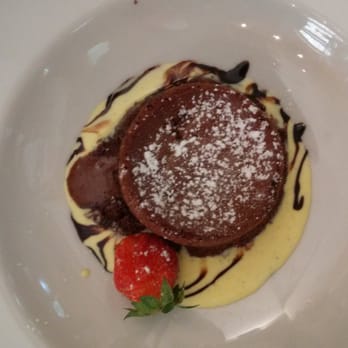 Enoteca Tognoni Francesco - Hot chocolate flan with creame - Cafes Near Me - Castagneto Carducci, AG Enoteca Tognoni Francesco - Hot chocolate flan with creame - Cafes Near Me - Castagneto Carducci, AG