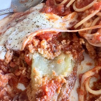 Giuseppe’s Italian Grill - One of the rounds of eggplant after much hunting under the mound of spaghetti. - Italian Near Me - San Antonio, Texas Giuseppe’s Italian Grill - One of the rounds of eggplant after much hunting under the mound of spaghetti. - Italian Near Me - San Antonio, Texas