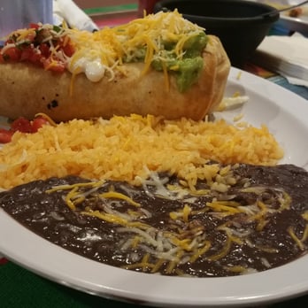 Cinco de Mayo - Chimichanga - the toppings look like the Mexican flag! - Mexican Near Me - Ocean City, New Jersey Cinco de Mayo - Chimichanga - the toppings look like the Mexican flag! - Mexican Near Me - Ocean City, New Jersey