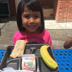 Bayside Elementary School - Enjoying her free bean and cheese burrito summer lunch
