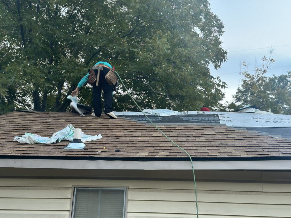 Slide of Alexander’s Roofing