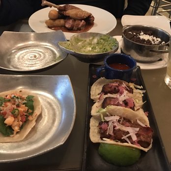 Caracol - Duck mole, lobster taco (1), tuna tacos (3), black refried beans. Empty bowl of chips and guac. Everything was really delicious!!! - Seafood Near Me - Houston, Texas Caracol - Duck mole, lobster taco (1), tuna tacos (3), black refried beans. Empty bowl of chips and guac. Everything was really delicious!!! - Seafood Near Me - Houston, Texas