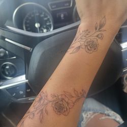 Timeless Tattoo Gallery - Fine line floral vine wrap tattoo.
