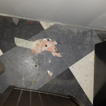 MAD Trades - Tiles broken and showing sub floor. - Handyman Near Me - Chesterton, Indiana