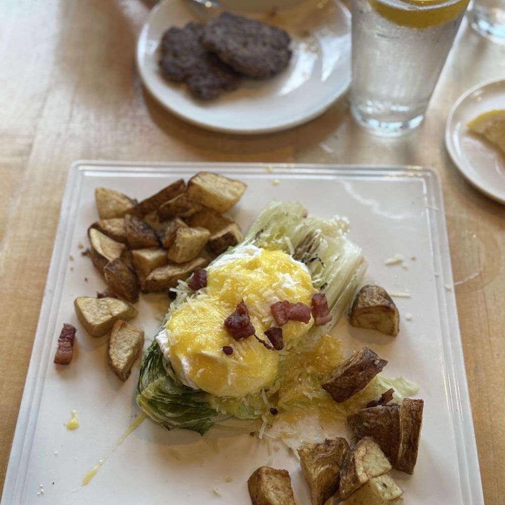 The Towne Plaza - Grilled Romaine with potatoes and a side of homemade sausage - Breakfast & Brunch Near Me - Traverse City, Michigan The Towne Plaza - Grilled Romaine with potatoes and a side of homemade sausage - Breakfast & Brunch Near Me - Traverse City, Michigan