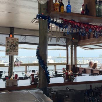 Avenue Pub - Orange Beach - This is the bar area, along with some amazing views of Orange Beach, and the boat docs! - American Near Me - Orange Beach, Alabama