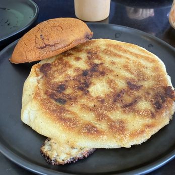 Fogata Latin Fusion - Pupusa Revuelta Brisket Empanada - Latin American Near Me - Houston, Texas Fogata Latin Fusion - Pupusa Revuelta Brisket Empanada - Latin American Near Me - Houston, Texas