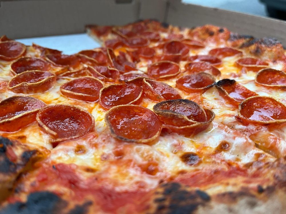 Shivkumoto Pizza Logo