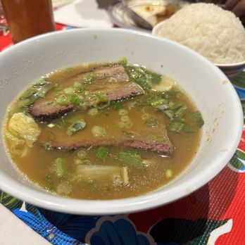 Eem - Spicy Jungle Curry with Sliced Brisket - Cocktail Bars Near Me - Portland, Oregon Eem - Spicy Jungle Curry with Sliced Brisket - Cocktail Bars Near Me - Portland, Oregon