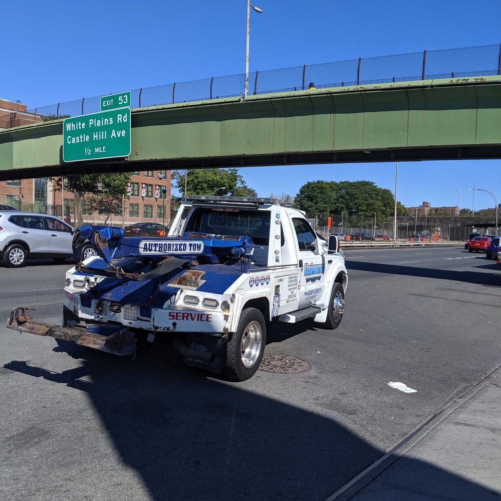 Universe Towing - Universe Towing truck is leaving us on the side of the road because we refused to take our car to his body shop! - Towing Near Me - Bronx, New York Universe Towing - Universe Towing truck is leaving us on the side of the road because we refused to take our car to his body shop! - Towing Near Me - Bronx, New York