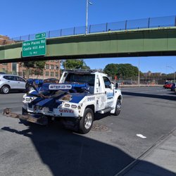 Universe Towing - Universe Towing truck is leaving us on the side of the road because we refused to take our car to his body shop!