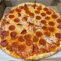 Surfside Beach Pizza & Restaurant - It was regular pepperoni and so good. Get the extra side of sauce.