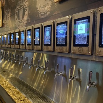 Oak and Stone - Beer wall - Pizza Near Me - Naples, Florida