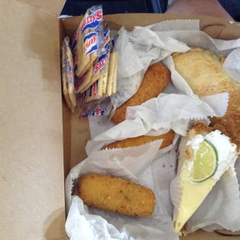 Versailles Bakery - Three croquetas (93 cents each), one empanada ($1.75), and one yummy key lime pie slice ($2.75). Also crackers for some reason - Bakeries Near Me - Miami, Florida Versailles Bakery - Three croquetas (93 cents each), one empanada ($1.75), and one yummy key lime pie slice ($2.75). Also crackers for some reason - Bakeries Near Me - Miami, Florida