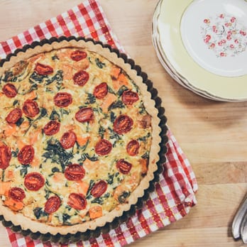 MotherOrganica - a quiche with tomatoes and spinach - Food Delivery Services Near Me MotherOrganica - a quiche with tomatoes and spinach - Food Delivery Services Near Me