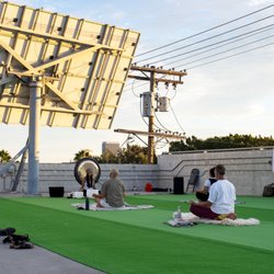 Astro Gong Yoga - Our rooftop Yoga classes incorporate sound healing.