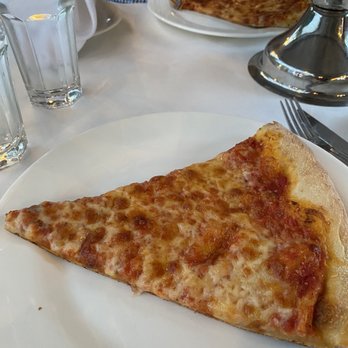Gino's Restaurant - The huge slice! - Pizza Near Me - Brooklyn, New York Gino's Restaurant - The huge slice! - Pizza Near Me - Brooklyn, New York