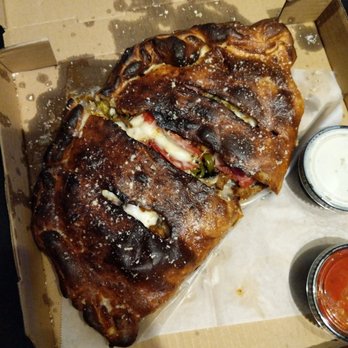 Oblio's Pizzeria - Miserable burnt soggy inedible $22 calzone - Pizza Near Me - Denver, Colorado
