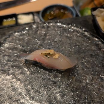 Thirteen Water - Shima Aji - striped jack with ginger scallion and fried garlic - Sushi Bars Near Me - New York, New York Thirteen Water - Shima Aji - striped jack with ginger scallion and fried garlic - Sushi Bars Near Me - New York, New York
