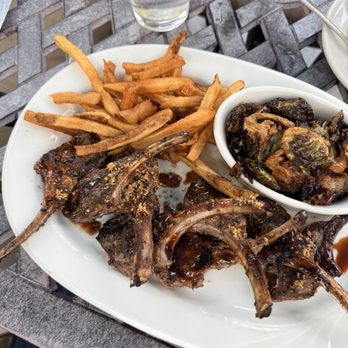 Outwest - Lamb Lollipop Chops, Roasted Brussels Sprouts, Fresh-Cut Fries - Steakhouses Near Me - Kernersville, North Carolina