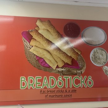 Pizza Fast - breadsticks in a basket with dipping sauce - Pizza Near Me - La Habra, California Pizza Fast - breadsticks in a basket with dipping sauce - Pizza Near Me - La Habra, California