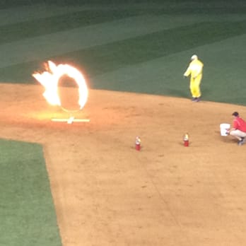 Richmond Flying Squirrels - A circus performer daringly jumps through the (literal) ring of fire. Plot reveal: he survived! - Professional Sports Teams Near Me - Richmond, Virginia