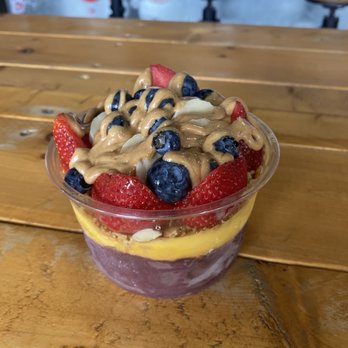 Bowldega - Açaí and mango with honey almond granola, strawberries, banana, blueberries, peanut butter, and honey - Acai Bowls Near Me - Dallas, Texas